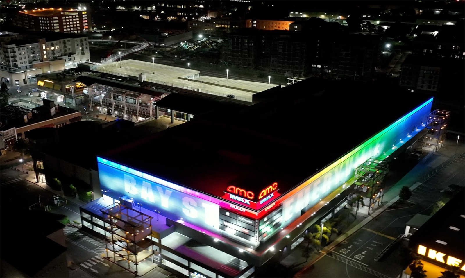 Bay Street aerial after — full-color DMX gradient across the entire façade
