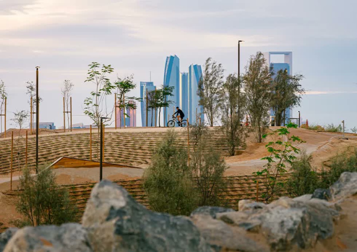 Trail X trails with the Abu Dhabi skyline behind